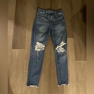 American Eagle Outfitters Ripped Blue Curvy Super High Rise Jegging